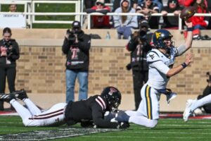 Texas Tech racks up 569 yards, pounds WVU 52-15